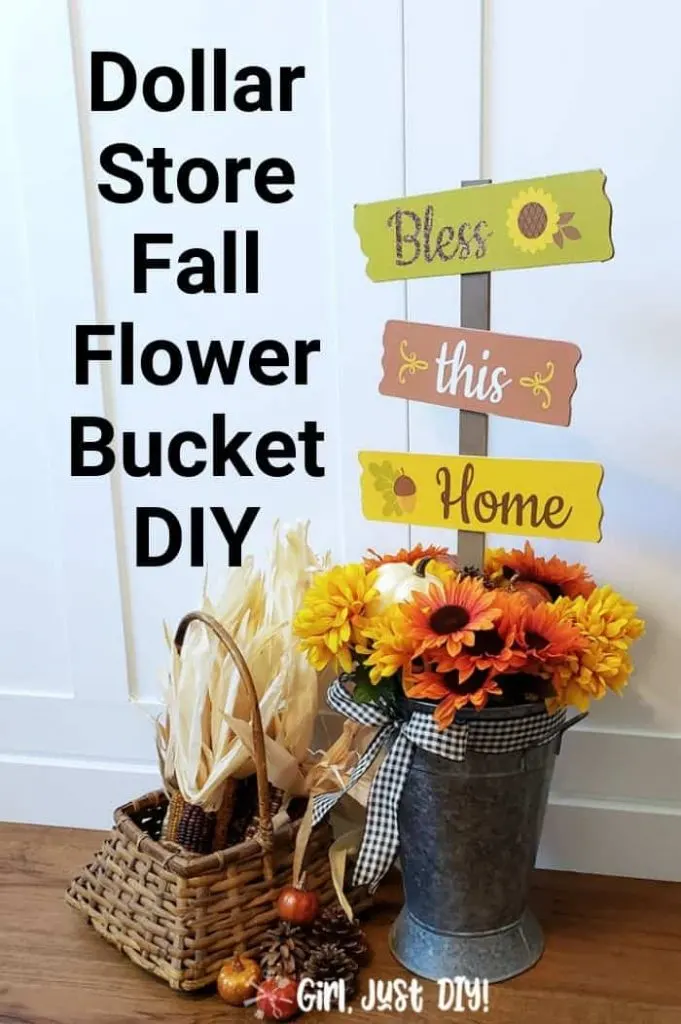 Dollar Store Fall flower bucket DIY on floor near white wall.