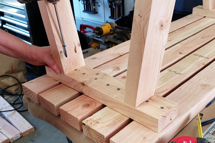 Attaching legs to bench top with pocket hole screws.