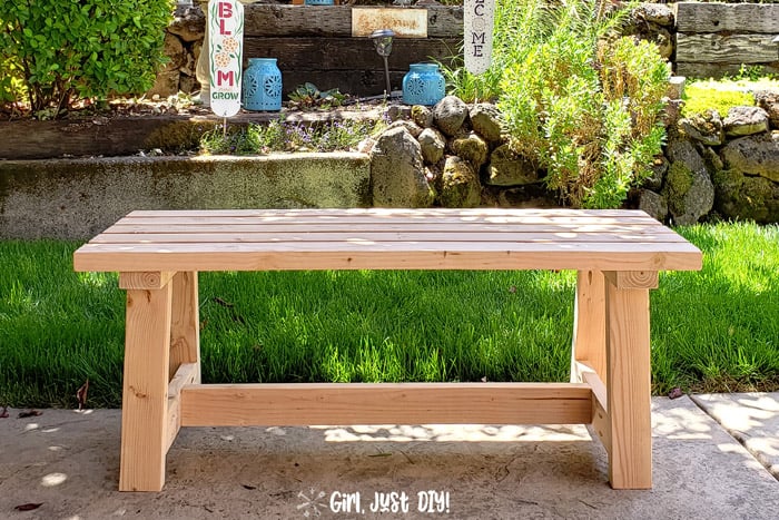 Finished Modern 2x4 Bench sitting on patio near the lawn.