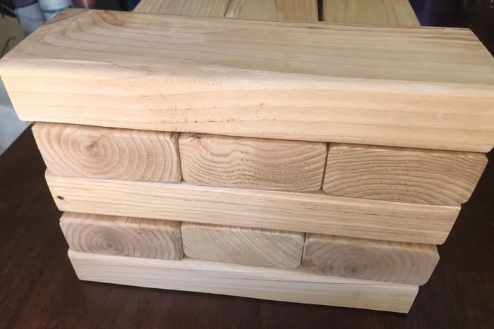 Closeup of stacked 2x4s for Giant Jenga game play.