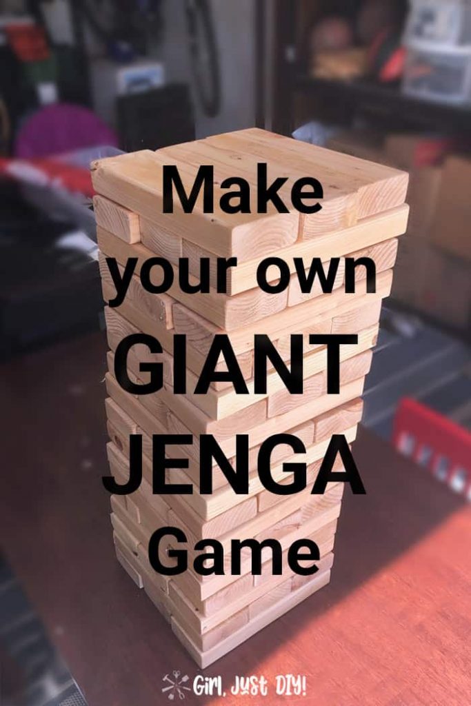 DIY Giant Jenga Game stacked on table with text overly for pinterest pin.