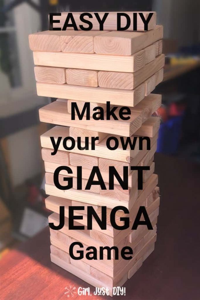 In play diy giant jenga game on table with text overlay for pinterest pin.