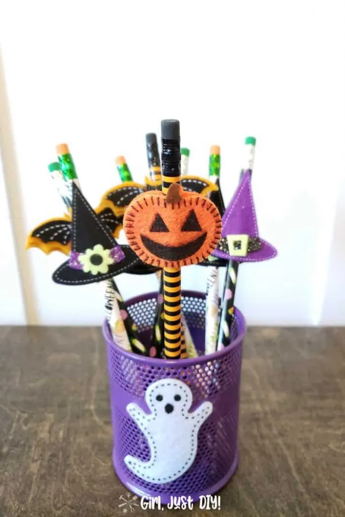 Pumpkin Halloween pencil in pencil cup.