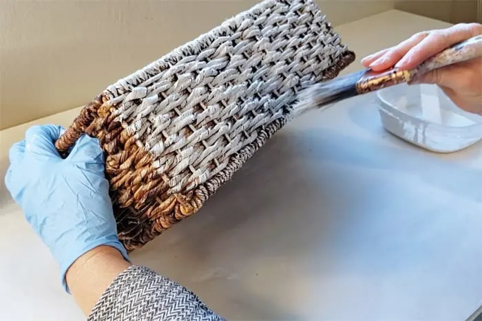 whitewashing the bottom of the wicker basket