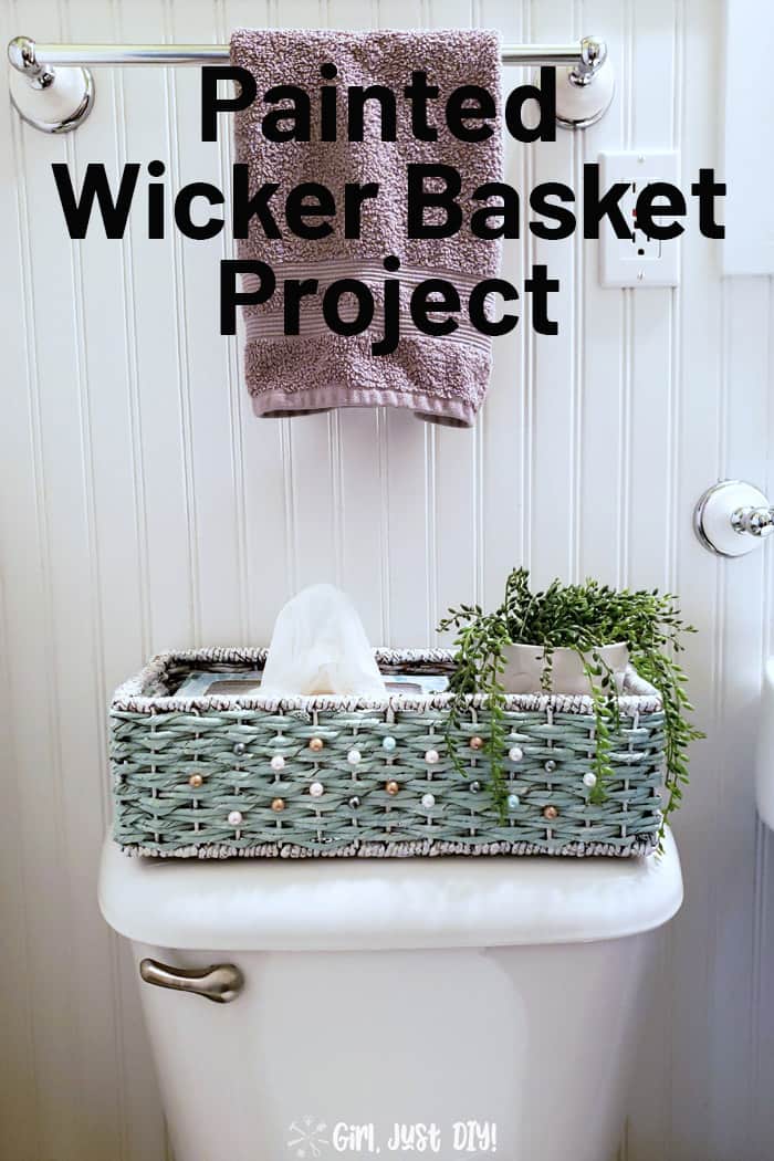 Updated and painted wicker basket on toilet with houseplant