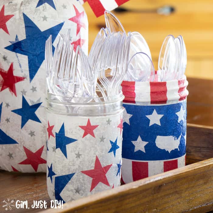 Closeup of 4th of July jars with plastic utensils