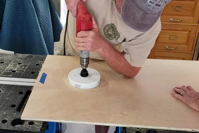 Using Drill and hole saw to make hole in 2x4 plywood sheet