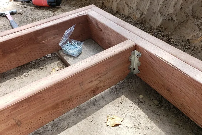 wooden frame with joists installed using joist hangers