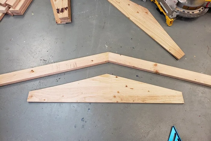 2x4s cut as roof trusses with gusset