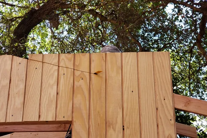 Cutting siding with a reciprocating saw.