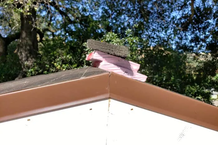 aluminum drip edge attached over roofing felt onto fascia