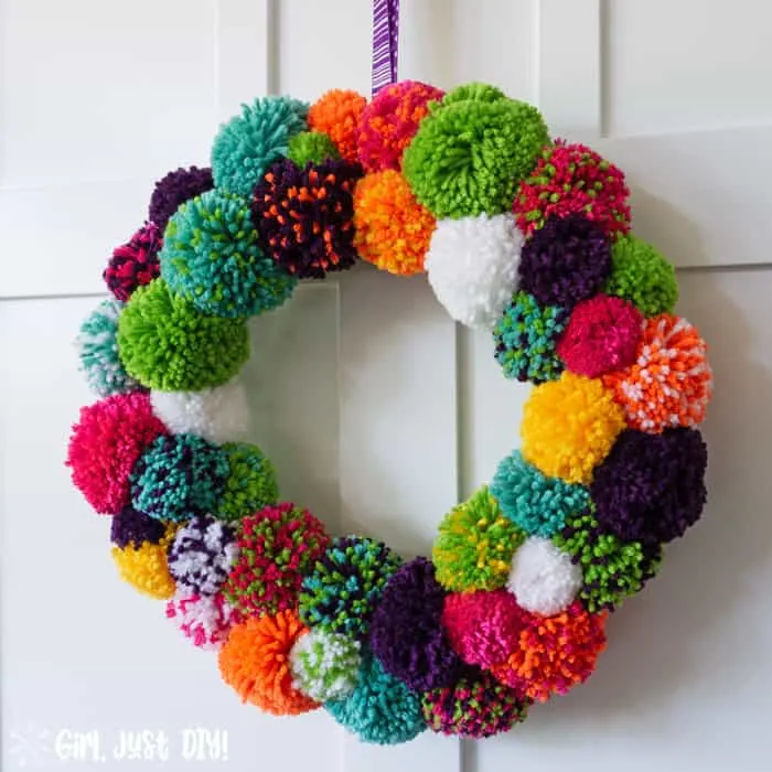 Closeup of colorful DIY Pompom Wreath