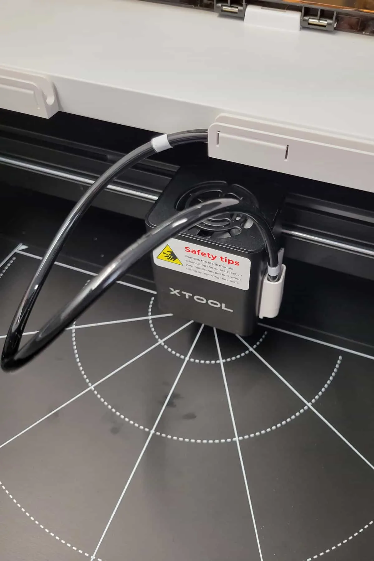 Inside of the xTool laser showing the laser module.