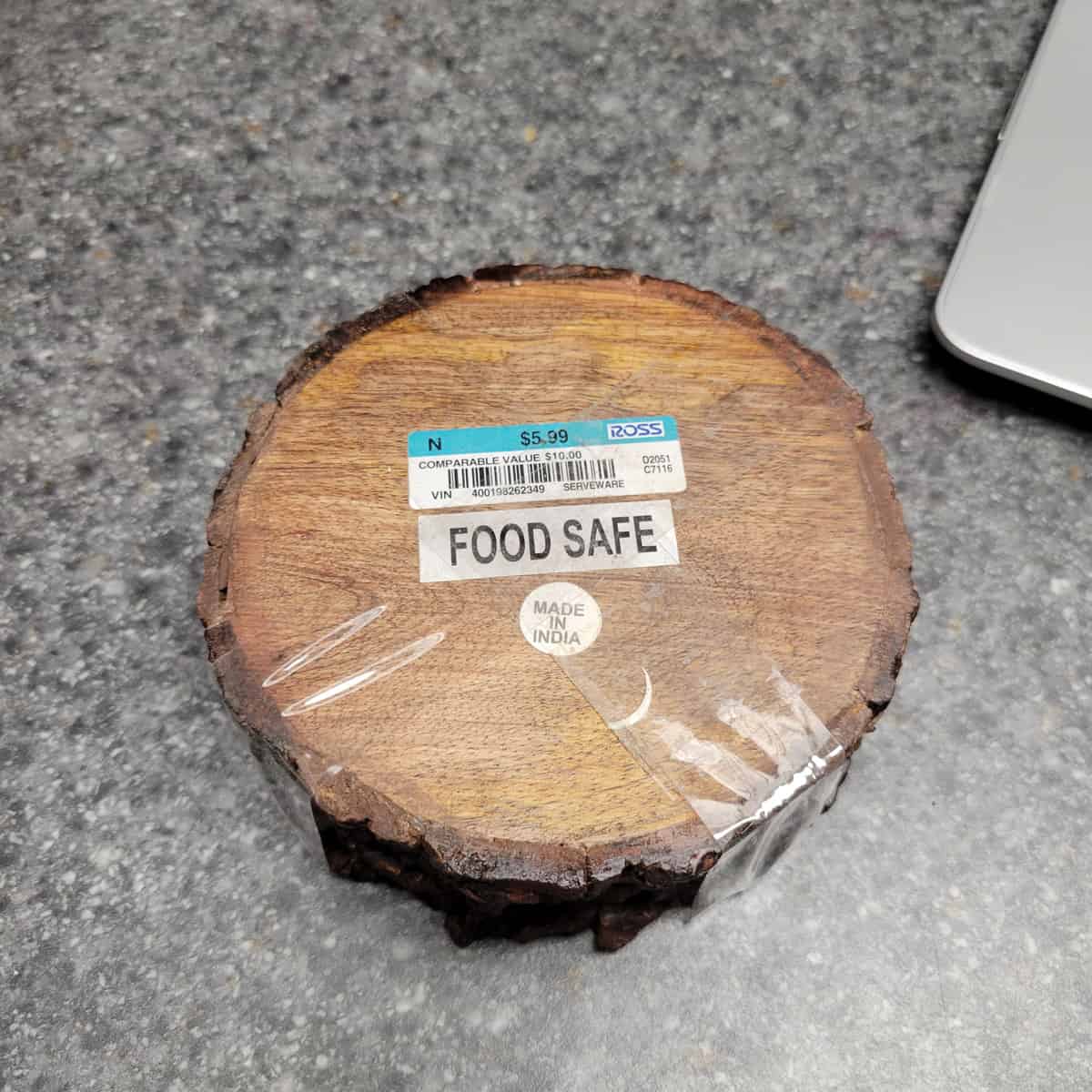 Set of wood slices taped together on a counter.