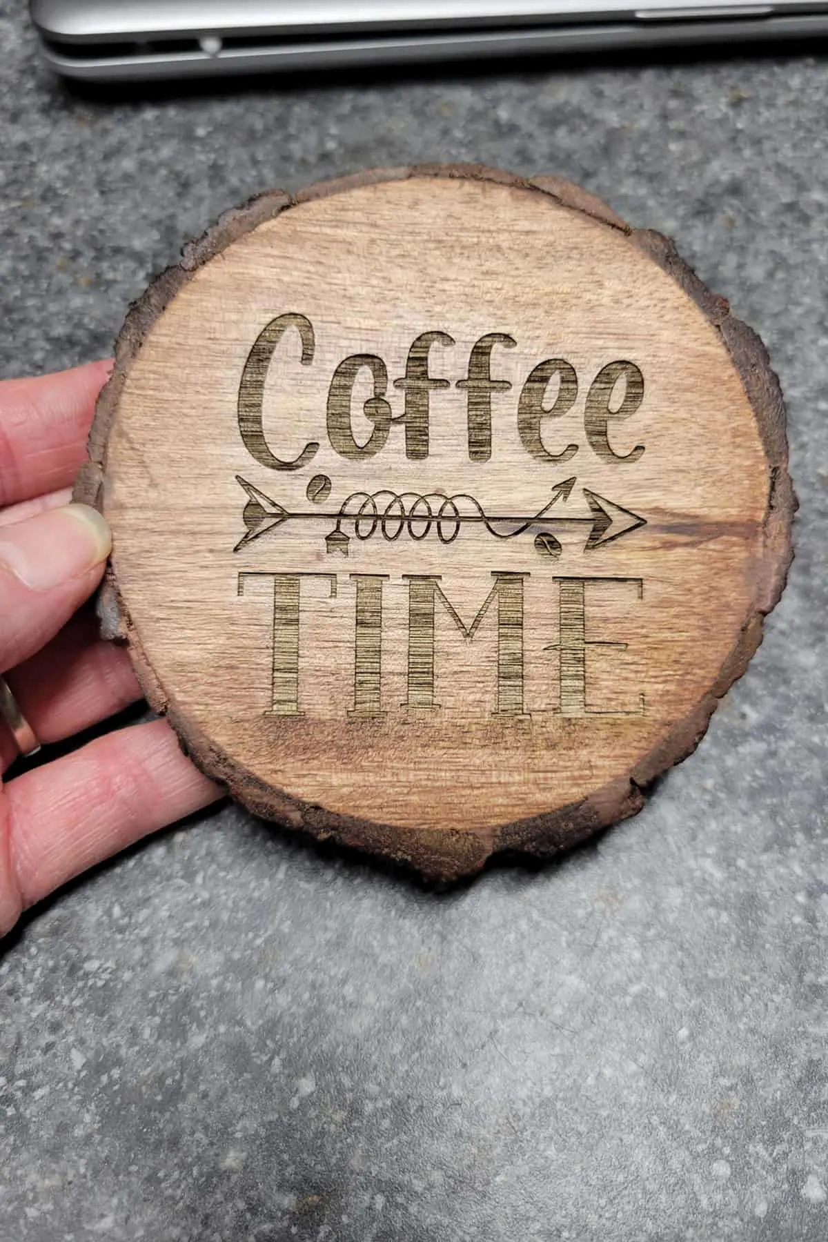 laser engraved wood coaster that says "coffee time"