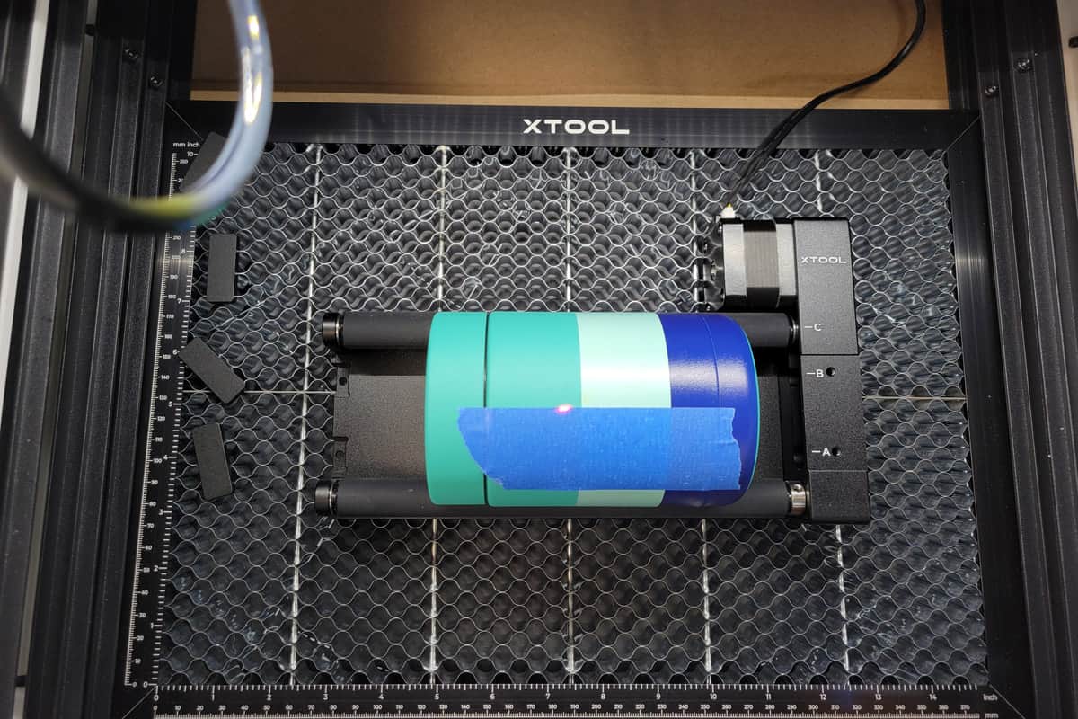 Inside over laser with RA2 device and a tumbler.