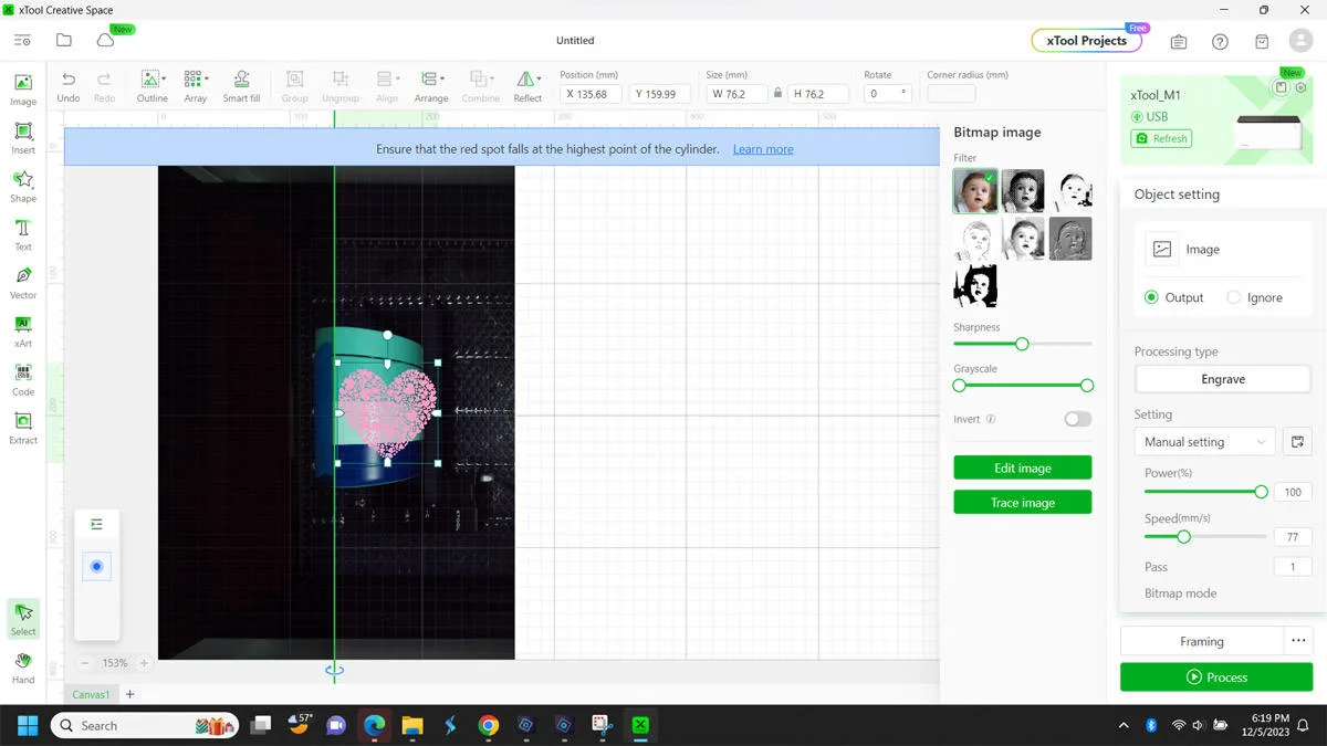 XCS on screen with heart graphic and settings in app.