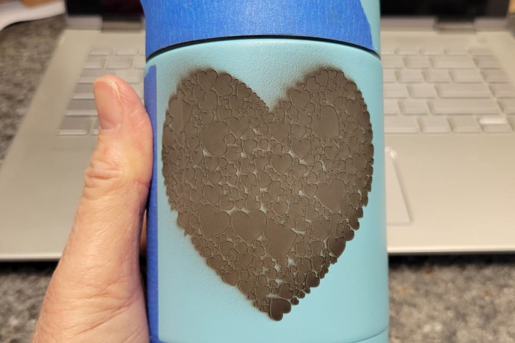 post engraving on tumbler with sooty heart